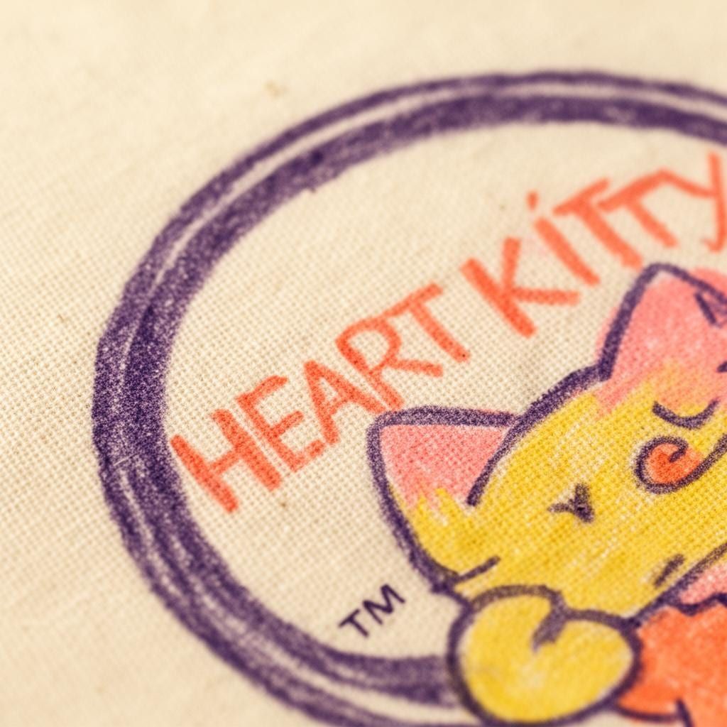 Heart Kitty Badge Tee in Natural — close-up detail 1